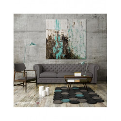 Cuadro abstracto en ambiente sobre sofá
