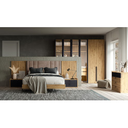 Ambiente de dormitorio con cabecero tapizado en acabado Rustic y Grafito